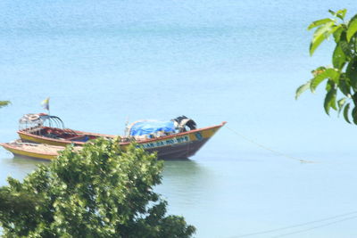 Boat in sea against sky