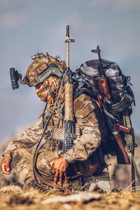 Soldier sitting on field