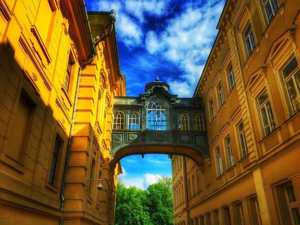 architecture, building exterior, sky, built structure, low angle view, cloud - sky, outdoors, no people, day, city