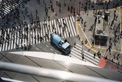 High angle view of crowd crossing road