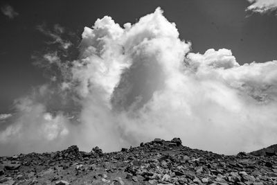 Scenic view of volcanic mountain against sky