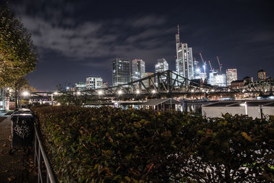 Illuminated buildings in city at night