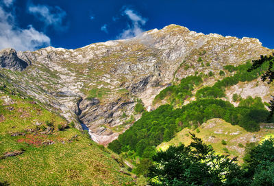 Scenic view of rocky mountains against sky