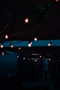 Low angle view of illuminated ceiling