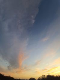 Low angle view of dramatic sky during sunset