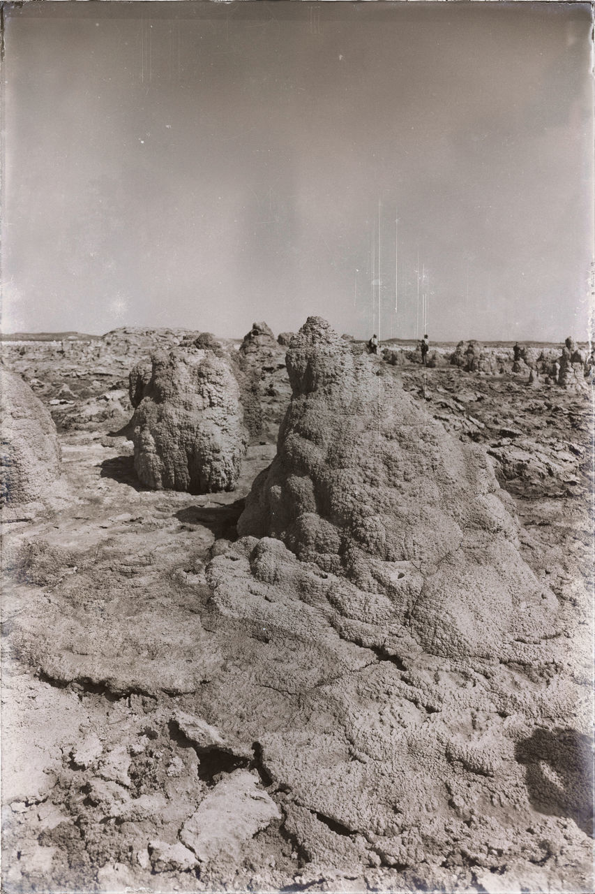 ROCK FORMATIONS ON LAND AGAINST SKY
