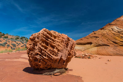 Rock formations in desert against sky