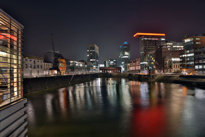 Dusseldorf media harbor district at night with modern office buildigs