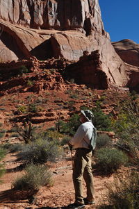 Woman standing on rock formation