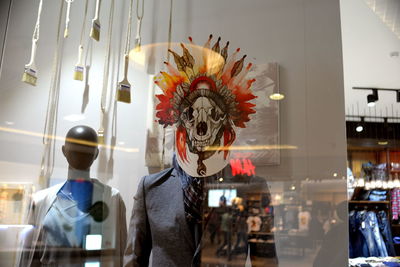 Midsection of woman standing in store