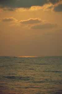 Scenic view of sea at sunset