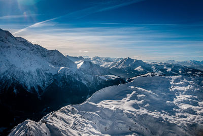 Scenic view of snowcapped mountain against sky