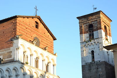 Low angle view of bell tower against clear sky