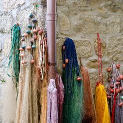 Panoramic shot of fishing net hanging on wall