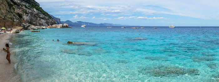 The beach of cala mariolu in gulf of orosei with turquoise water