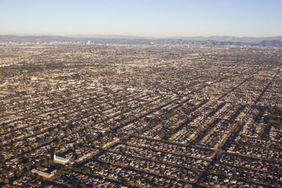 High angle view of buildings against clear sky