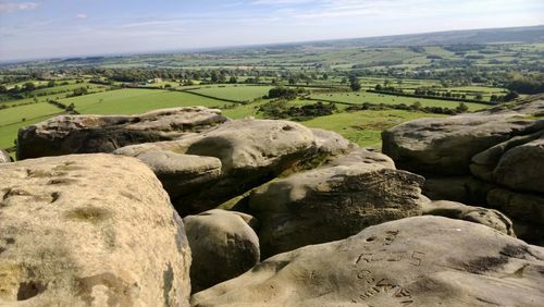 Rocks on land against sky