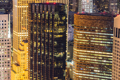 Modern buildings in city at night