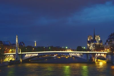 Bridge over river at night