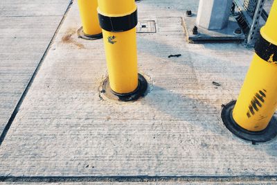 High angle view of yellow machine on road