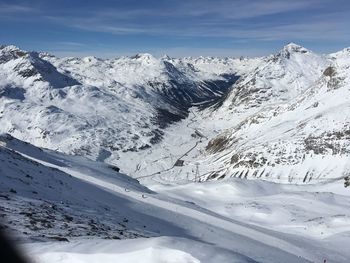 Scenic view of snow covered mountains