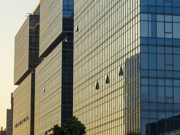 Low angle view of skyscrapers against sky