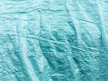 Full frame shot of blue textured tarpaulin