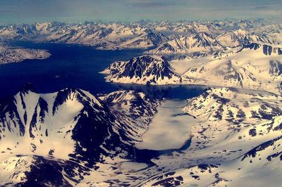 Scenic view of snow covered mountains