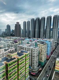 Buildings in city against sky