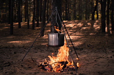 Container hanging over fireplace