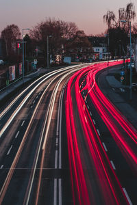 High angle view of light trails on highways at night