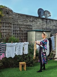Woman hanging out washing 