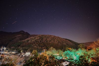 Low angle view of constellation over yufuin against sky