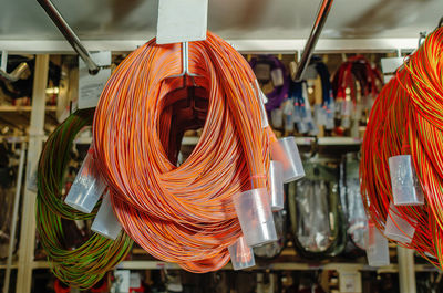 Showcases with wound colored cables for car production. industrial details