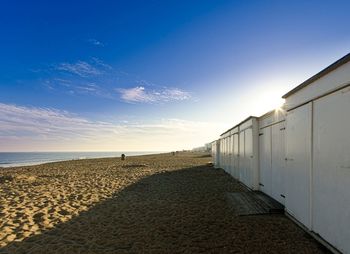 Scenic view of beach against sky during sunset