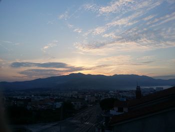 High angle view of cityscape against sky during sunset
