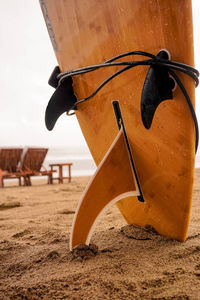 Close-up of wooden surfboard. back to the roots