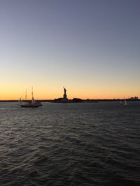 Scenic view of sea at sunset