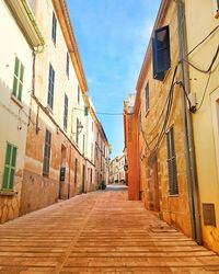 Narrow alley along buildings