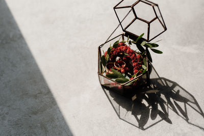 High angle view of rose bouquet on potted plant