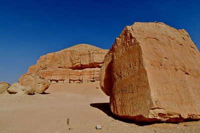 Low angle view of rock formations in desert