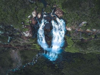 High angle view of waterfall in forest