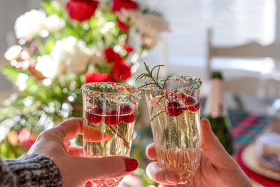Close-up of hand holding drink