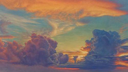 Low angle view of cloudy sky at sunset