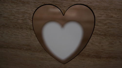 Close-up of heart shape on table