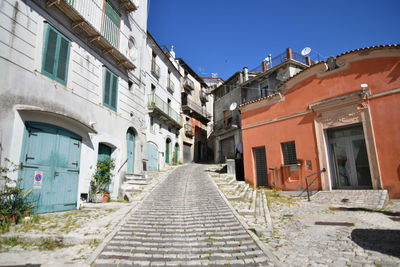 A narrow street of morcone, a medieval village in benevento province, italy.