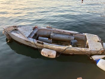 High angle view of abandoned boat moored in lake