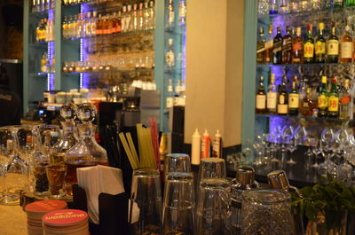 Wine bottles on table at restaurant