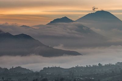 Scenic view of mountains against sky during sunset