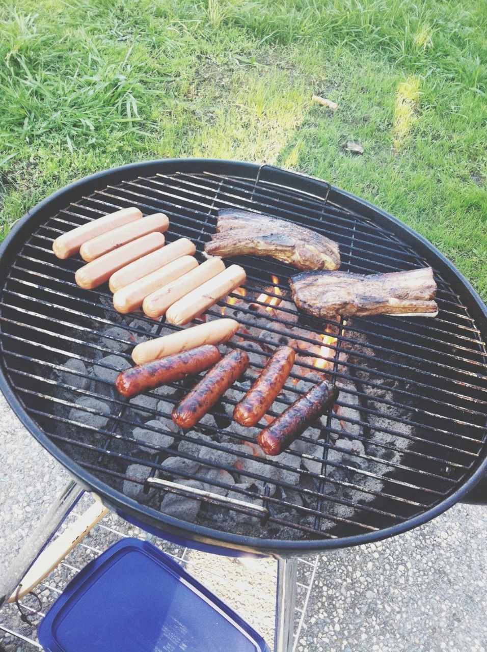 food, food and drink, freshness, cooking, high angle view, preparation, barbecue grill, preparing food, barbecue, grilled, meat, healthy eating, close-up, still life, heat - temperature, day, cooking pan, no people, directly above, metal